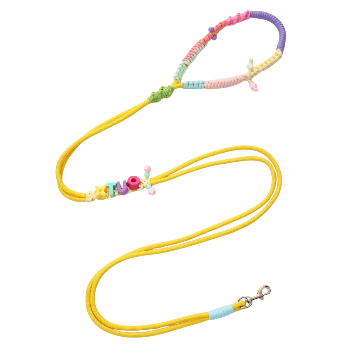 Custom handmade dog leash in bright yellow with personalized name 'HUGO' in colorful letter beads, featuring rainbow ombre macrame handle in pink, purple, mint, and yellow with decorative bead accents