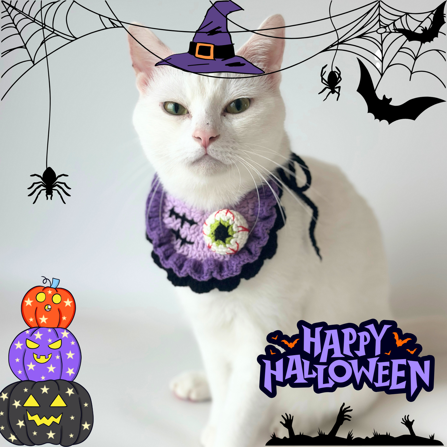 White cat wearing a Halloween-themed purple outfit with decorative elements on a light gray background.