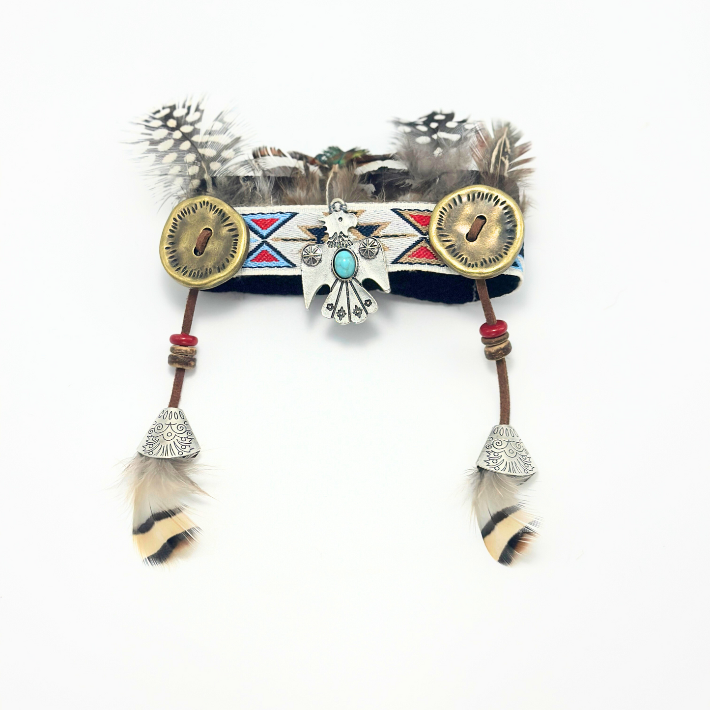 Decorative headband with feathers and tribal patterns on a white background