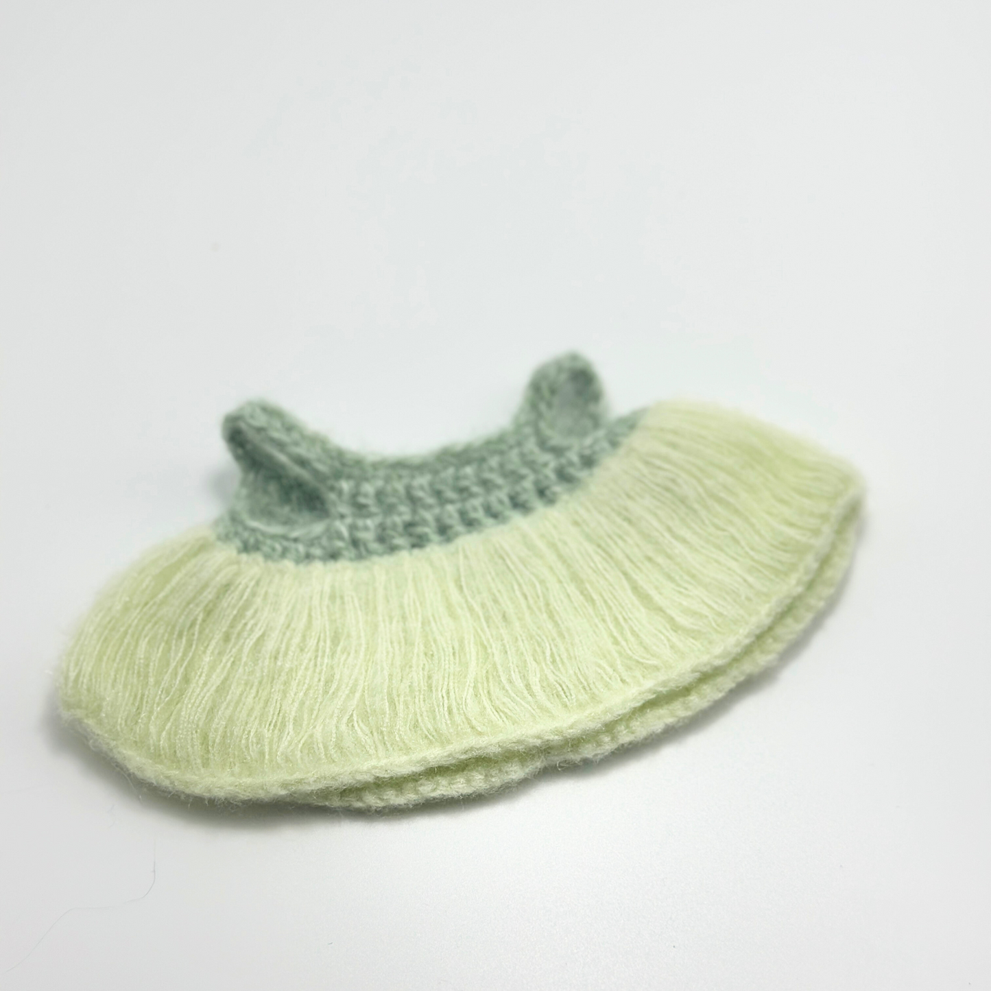 labubu Knitted green dress on a light gray background