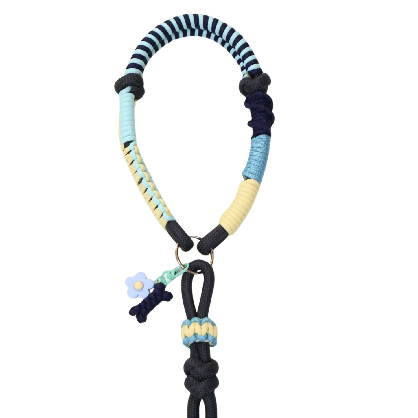 Detailed view of custom pet leash ergonomic handle with multi-colored rope wrapping, decorative charm attachments including blue flower, and reinforced knotted construction