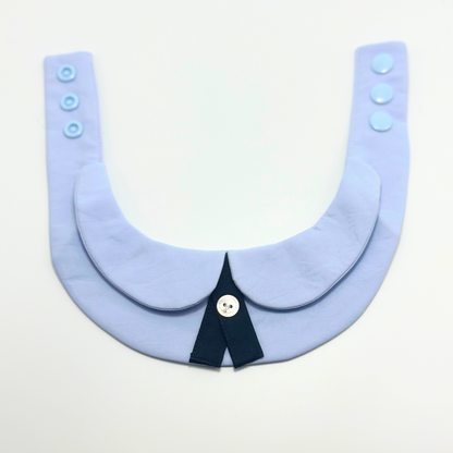 Pet formal collar bib front display showing blue rounded collar design, navy tie accent and snap button adjustable sizing system