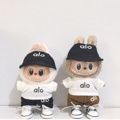Labubu dolls in alo sportswear outfit with black caps, white hoodies, shorts and matching white and black sneakers