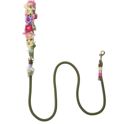 Olive green dog leash with colorful floral decorative sleeve featuring pink, blue, yellow and purple flowers with metal clasp