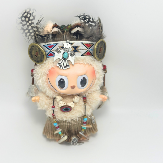
Labubu collectible toy dressed in bohemian tribal costume with feathers, geometric headband, beaded jewelry and fringed clothing accessories