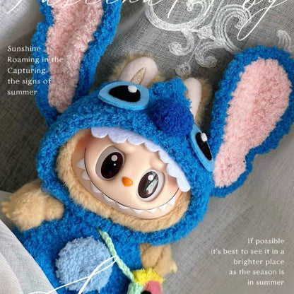 Labubu wearing stitch outfit with blue ears and a smiling face on a textured background.