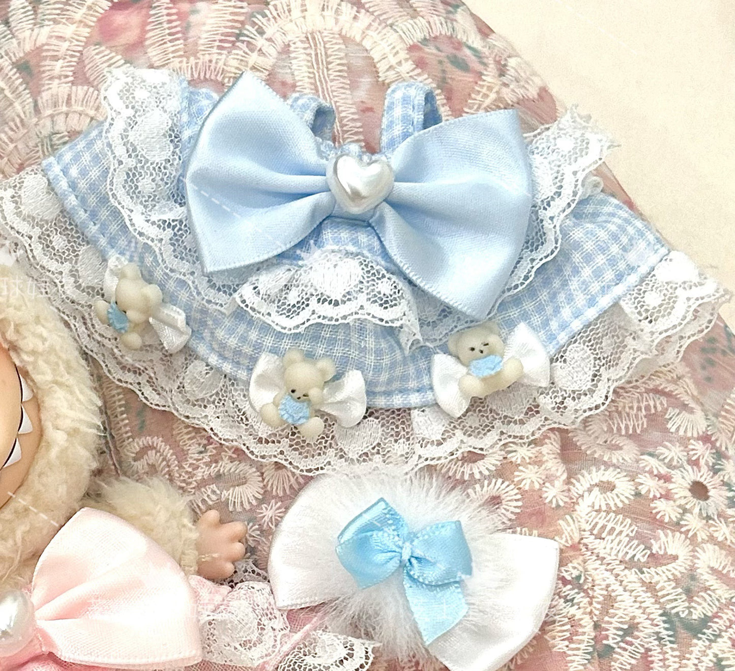 Labubu doll keychain couple set - matching sweet Lolita outfits in pink and blue with white lace trim, satin bows, bear decorations and gold keyring attachments