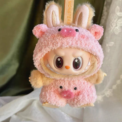 Adorable pink pig costume hoodie for Labubu doll - soft plush fabric with pig ears, snout and tail details - kawaii collectible doll clothing accessory