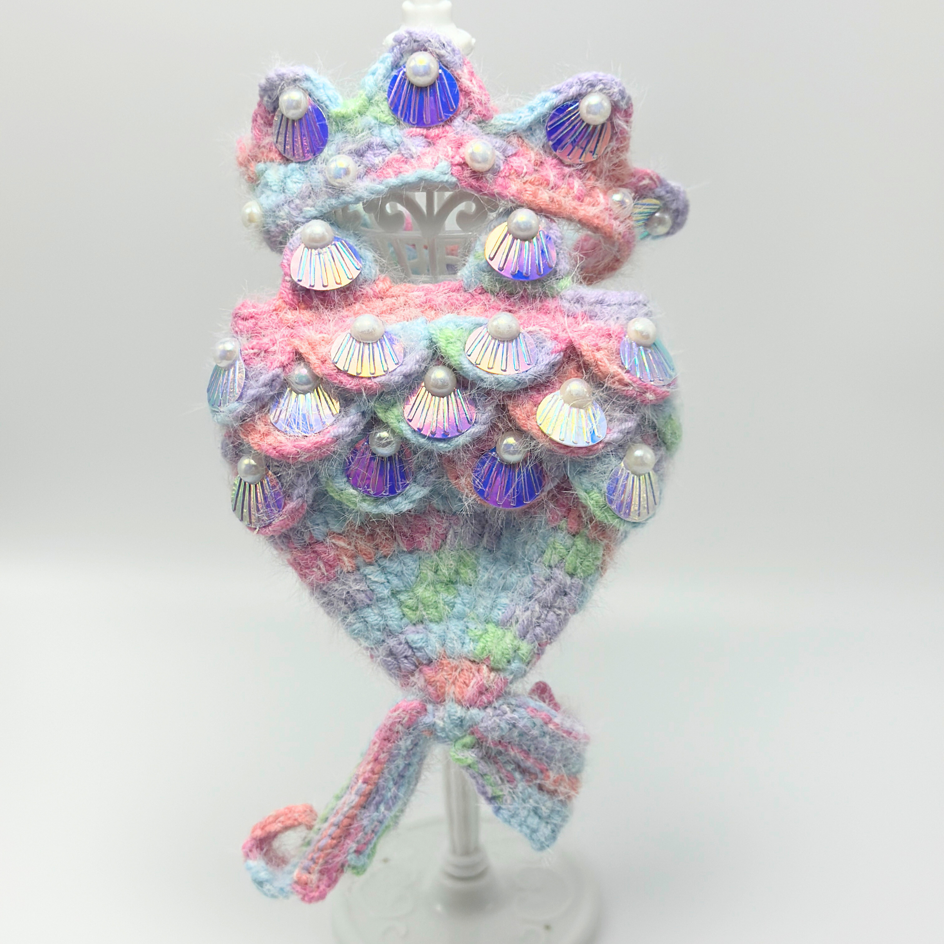 Rainbow mermaid coutfit for Labubu doll with iridescent sequin scales and holographic shell details - kawaii collectible doll clothing with fuzzy pastel tail ,white background.
