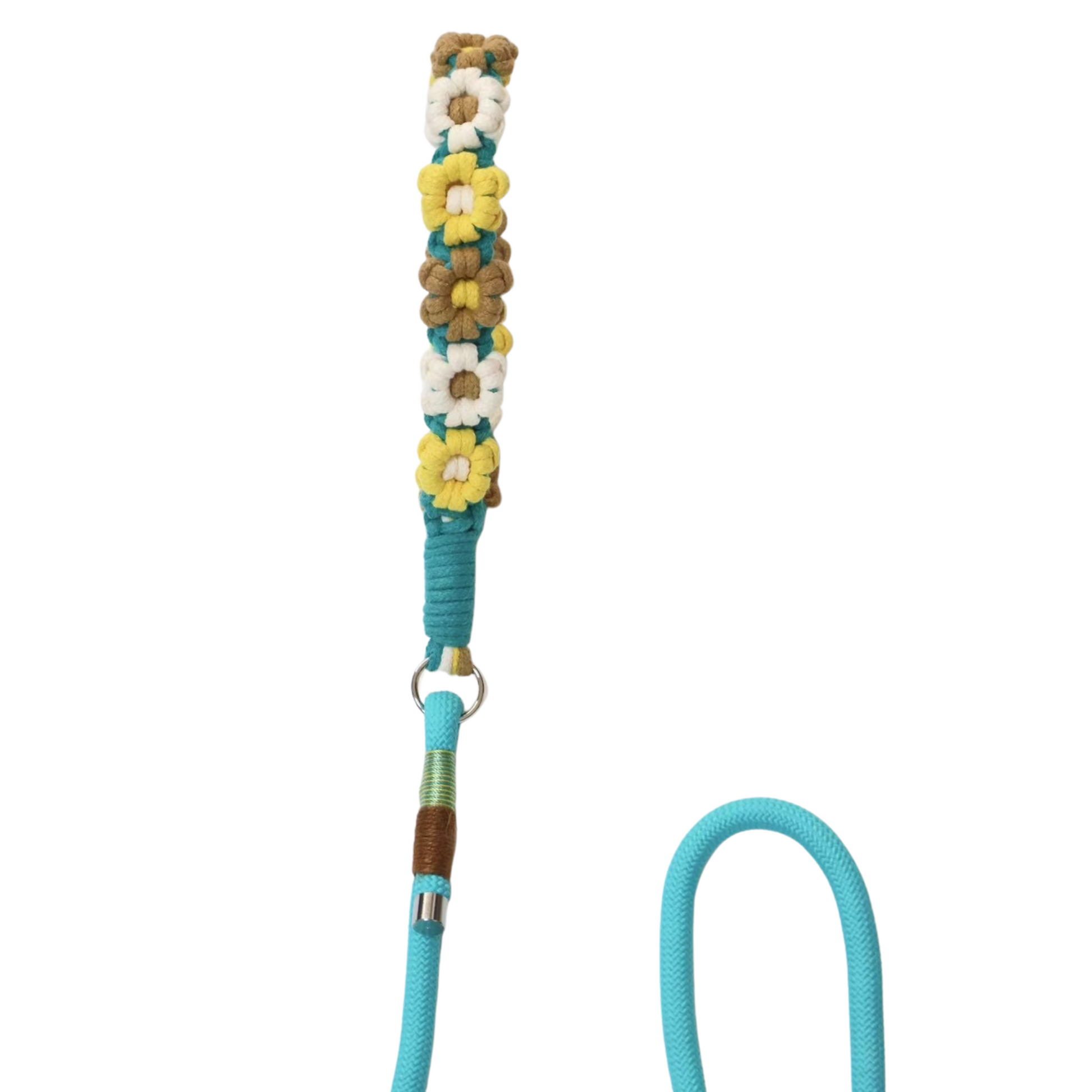 Close-up view of a decorative dog leash handle covered with layered artificial flowers in yellow, white, brown, and teal colors, with teal rope wrapping and colorful thread sections below